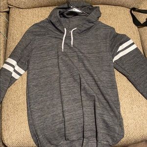 Grey Sweatshirt with white stripes on arms.